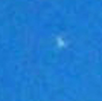 White object, magnified